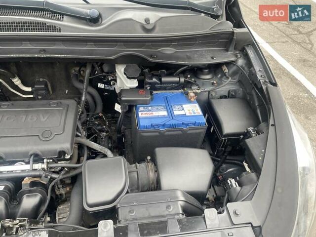 Серый Киа Sportage, объемом двигателя 2 л и пробегом 77 тыс. км за 12500 $, фото 27 на Automoto.ua
