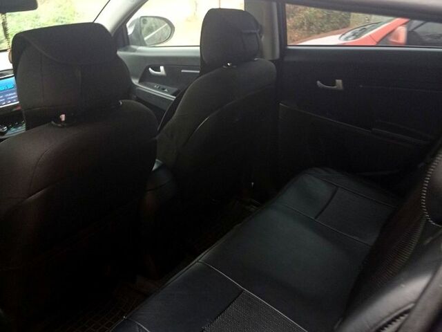 Серый Киа Sportage, объемом двигателя 1.7 л и пробегом 151 тыс. км за 11000 $, фото 5 на Automoto.ua