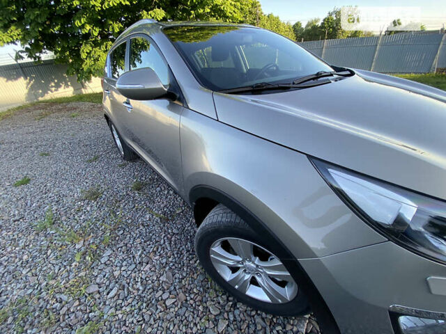 Серый Киа Sportage, объемом двигателя 1.7 л и пробегом 101 тыс. км за 12990 $, фото 104 на Automoto.ua