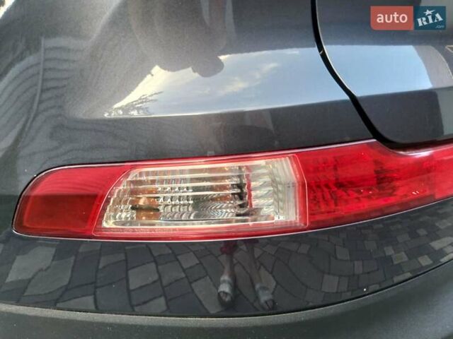 Сірий Кіа Sportage, об'ємом двигуна 2 л та пробігом 230 тис. км за 12400 $, фото 23 на Automoto.ua