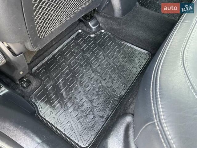 Серый Киа Sportage, объемом двигателя 2 л и пробегом 246 тыс. км за 12999 $, фото 86 на Automoto.ua