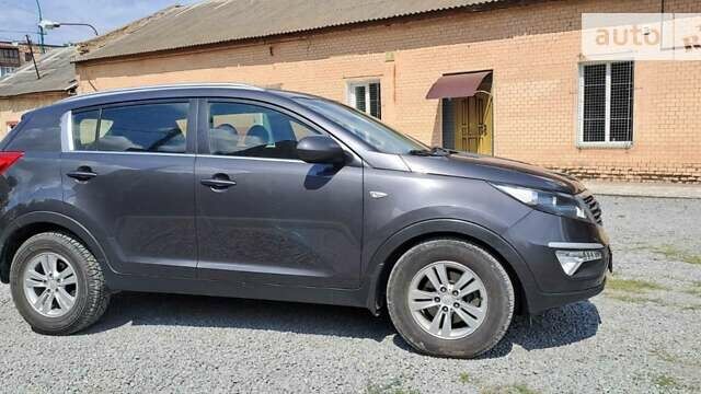 Серый Киа Sportage, объемом двигателя 1.7 л и пробегом 130 тыс. км за 12600 $, фото 1 на Automoto.ua