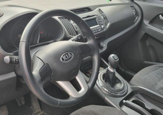 Серый Киа Sportage, объемом двигателя 1.7 л и пробегом 300 тыс. км за 11900 $, фото 3 на Automoto.ua