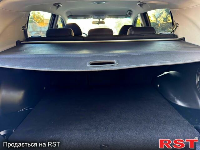Сірий Кіа Sportage, об'ємом двигуна 2 л та пробігом 140 тис. км за 11980 $, фото 3 на Automoto.ua