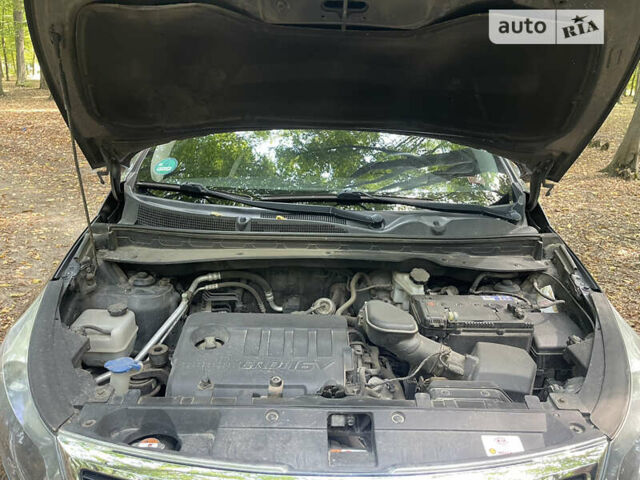Серый Киа Sportage, объемом двигателя 1.7 л и пробегом 243 тыс. км за 12400 $, фото 16 на Automoto.ua