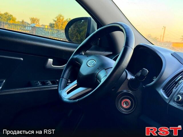 Сірий Кіа Sportage, об'ємом двигуна 2 л та пробігом 140 тис. км за 11980 $, фото 4 на Automoto.ua