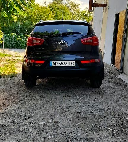 Серый Киа Sportage, объемом двигателя 2 л и пробегом 234 тыс. км за 11000 $, фото 4 на Automoto.ua
