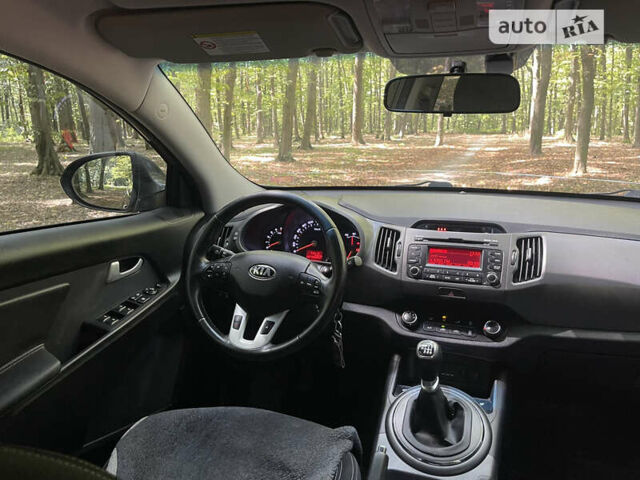 Серый Киа Sportage, объемом двигателя 1.7 л и пробегом 243 тыс. км за 12400 $, фото 13 на Automoto.ua