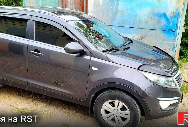 Серый Киа Sportage, объемом двигателя 2 л и пробегом 234 тыс. км за 11000 $, фото 3 на Automoto.ua