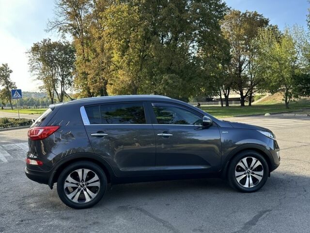 Сірий Кіа Sportage, об'ємом двигуна 2 л та пробігом 153 тис. км за 12500 $, фото 4 на Automoto.ua