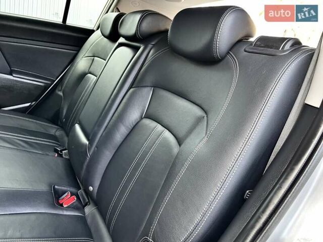 Серый Киа Sportage, объемом двигателя 2 л и пробегом 246 тыс. км за 12999 $, фото 85 на Automoto.ua