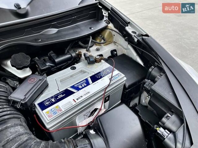 Серый Киа Sportage, объемом двигателя 2 л и пробегом 246 тыс. км за 12999 $, фото 93 на Automoto.ua