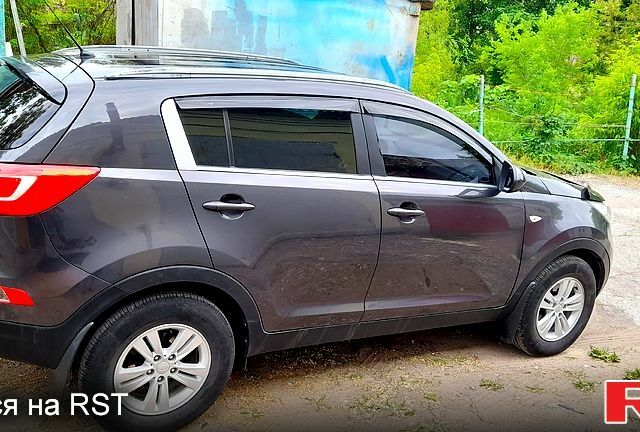 Серый Киа Sportage, объемом двигателя 2 л и пробегом 234 тыс. км за 11000 $, фото 6 на Automoto.ua