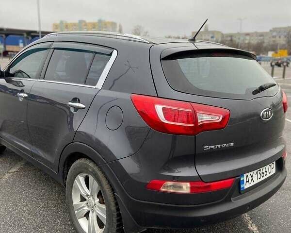 Серый Киа Sportage, объемом двигателя 2 л и пробегом 154 тыс. км за 12000 $, фото 4 на Automoto.ua