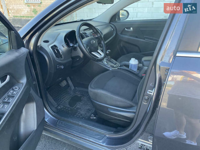 Серый Киа Sportage, объемом двигателя 2 л и пробегом 174 тыс. км за 13500 $, фото 10 на Automoto.ua