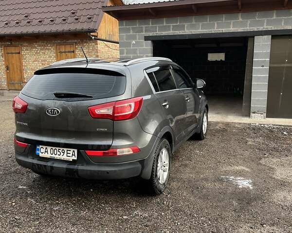Серый Киа Sportage, объемом двигателя 1.7 л и пробегом 162 тыс. км за 12500 $, фото 4 на Automoto.ua