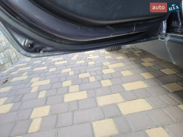 Сірий Кіа Sportage, об'ємом двигуна 2 л та пробігом 138 тис. км за 14200 $, фото 3 на Automoto.ua