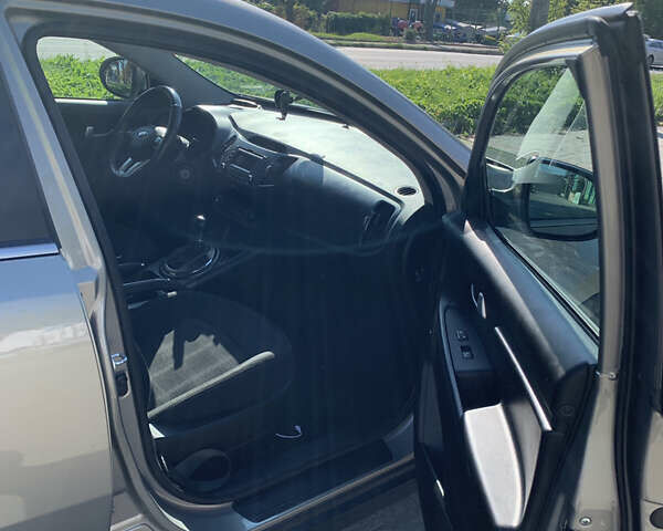 Серый Киа Sportage, объемом двигателя 2 л и пробегом 219 тыс. км за 13500 $, фото 18 на Automoto.ua