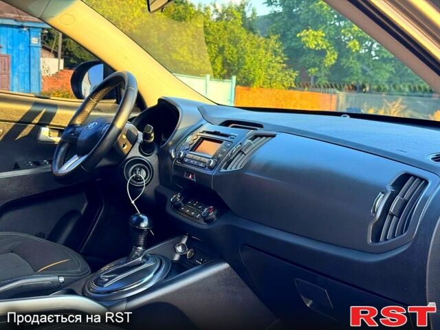 Серый Киа Sportage, объемом двигателя 2 л и пробегом 141 тыс. км за 12850 $, фото 8 на Automoto.ua