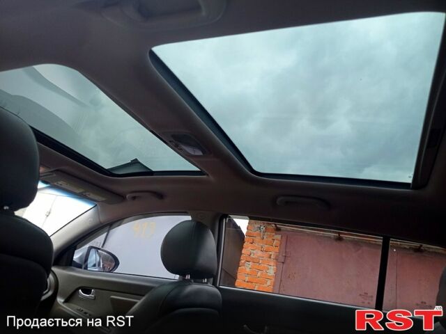 Серый Киа Sportage, объемом двигателя 2.4 л и пробегом 168 тыс. км за 13200 $, фото 7 на Automoto.ua