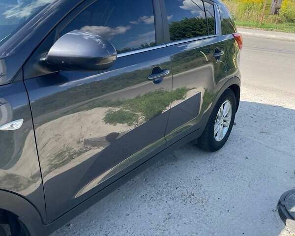 Серый Киа Sportage, объемом двигателя 2 л и пробегом 188 тыс. км за 13000 $, фото 2 на Automoto.ua