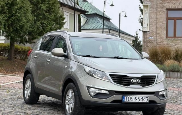 Серый Киа Sportage, объемом двигателя 2 л и пробегом 220 тыс. км за 8000 $, фото 1 на Automoto.ua