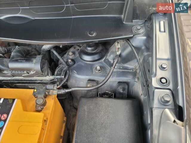 Сірий Кіа Sportage, об'ємом двигуна 2 л та пробігом 138 тис. км за 14200 $, фото 11 на Automoto.ua