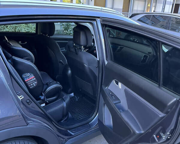 Серый Киа Sportage, объемом двигателя 2 л и пробегом 190 тыс. км за 15500 $, фото 7 на Automoto.ua