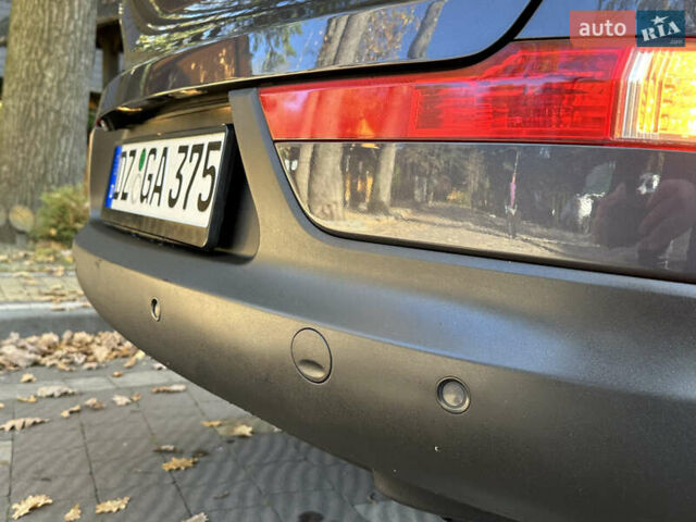 Серый Киа Sportage, объемом двигателя 2 л и пробегом 197 тыс. км за 14599 $, фото 75 на Automoto.ua