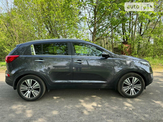 Сірий Кіа Sportage, об'ємом двигуна 2 л та пробігом 75 тис. км за 17500 $, фото 33 на Automoto.ua