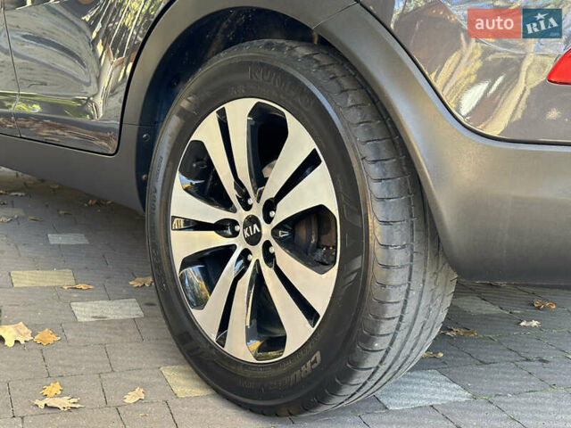 Серый Киа Sportage, объемом двигателя 2 л и пробегом 197 тыс. км за 14599 $, фото 84 на Automoto.ua