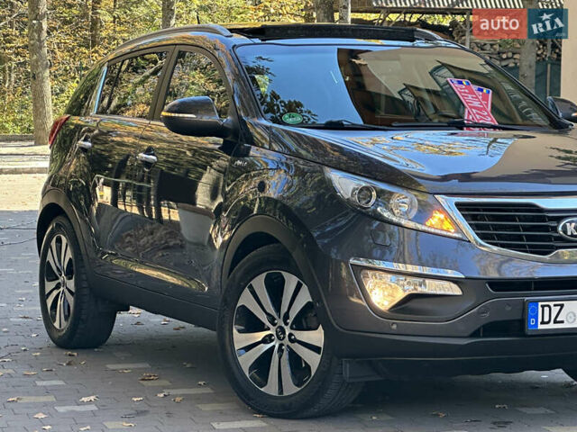 Серый Киа Sportage, объемом двигателя 2 л и пробегом 197 тыс. км за 14599 $, фото 44 на Automoto.ua
