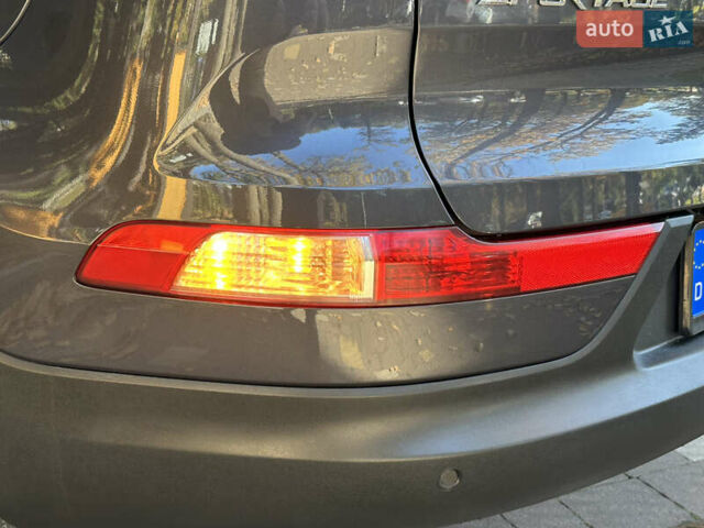 Серый Киа Sportage, объемом двигателя 2 л и пробегом 197 тыс. км за 14599 $, фото 88 на Automoto.ua