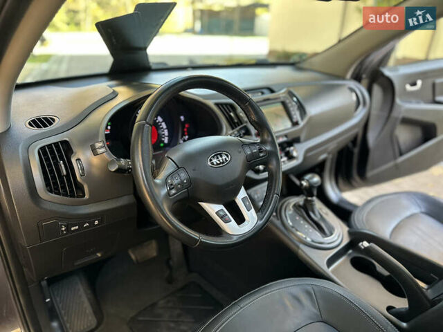 Серый Киа Sportage, объемом двигателя 2 л и пробегом 197 тыс. км за 14599 $, фото 116 на Automoto.ua