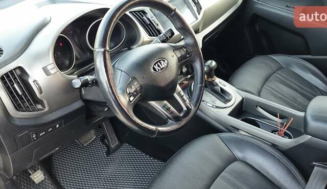Сірий Кіа Sportage, об'ємом двигуна 2 л та пробігом 208 тис. км за 14800 $, фото 1 на Automoto.ua