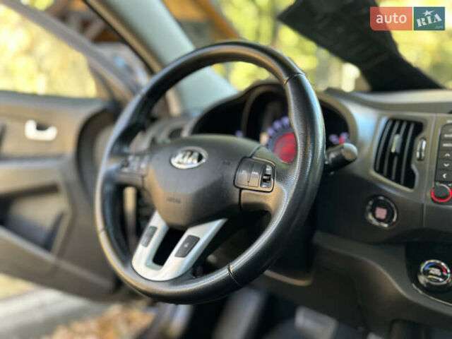 Серый Киа Sportage, объемом двигателя 2 л и пробегом 197 тыс. км за 14599 $, фото 102 на Automoto.ua