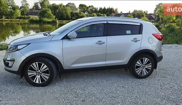 Сірий Кіа Sportage, об'ємом двигуна 2 л та пробігом 208 тис. км за 14800 $, фото 13 на Automoto.ua