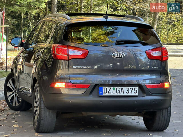 Серый Киа Sportage, объемом двигателя 2 л и пробегом 197 тыс. км за 14599 $, фото 79 на Automoto.ua