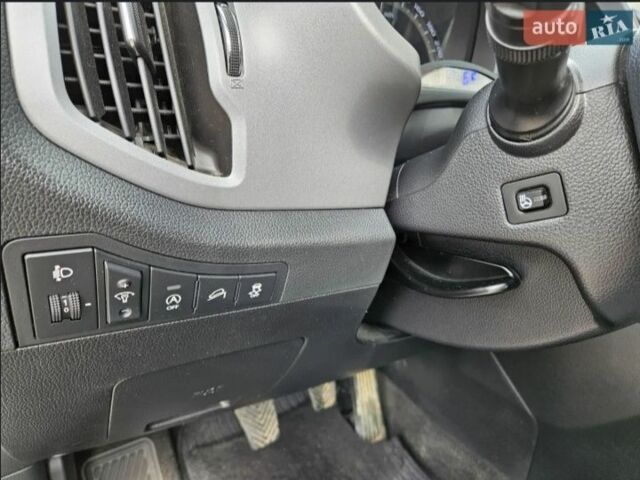 Серый Киа Sportage, объемом двигателя 1.6 л и пробегом 126 тыс. км за 12800 $, фото 5 на Automoto.ua