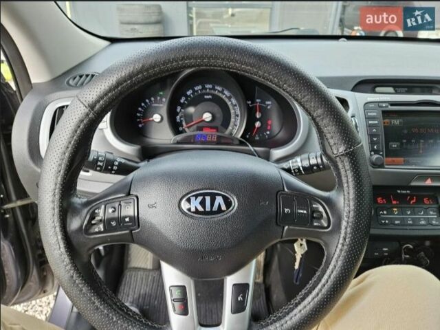 Серый Киа Sportage, объемом двигателя 1.6 л и пробегом 126 тыс. км за 12800 $, фото 4 на Automoto.ua