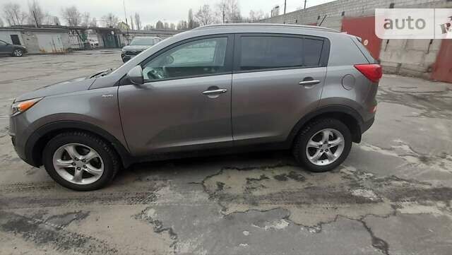 Серый Киа Sportage, объемом двигателя 2.4 л и пробегом 130 тыс. км за 15000 $, фото 3 на Automoto.ua