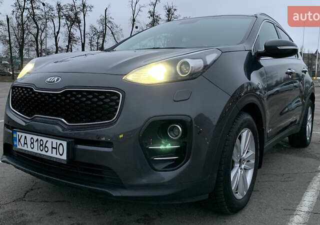 Серый Киа Sportage, объемом двигателя 2 л и пробегом 209 тыс. км за 18500 $, фото 1 на Automoto.ua