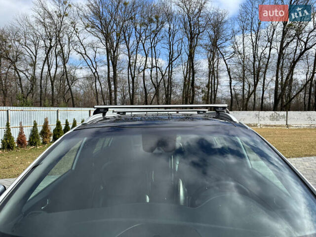 Серый Киа Sportage, объемом двигателя 2 л и пробегом 243 тыс. км за 22000 $, фото 5 на Automoto.ua