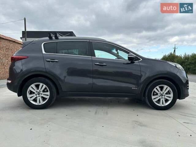 Серый Киа Sportage, объемом двигателя 2 л и пробегом 170 тыс. км за 18000 $, фото 4 на Automoto.ua