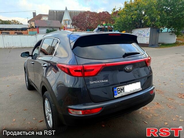 Серый Киа Sportage, объемом двигателя 2 л и пробегом 80 тыс. км за 17800 $, фото 2 на Automoto.ua