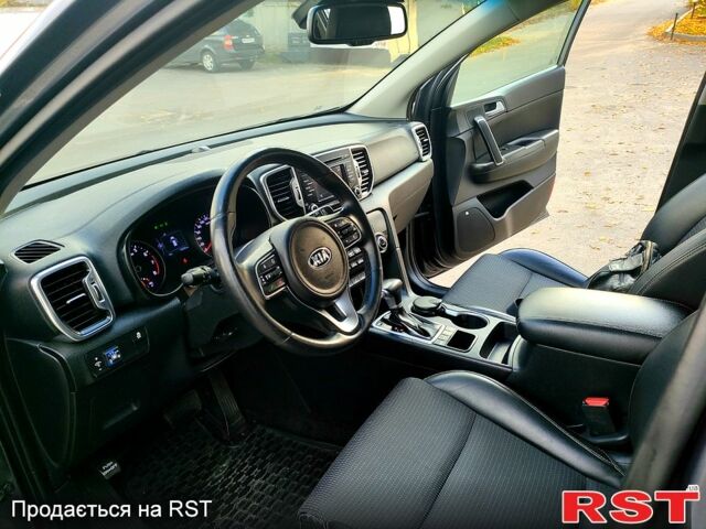 Серый Киа Sportage, объемом двигателя 2 л и пробегом 80 тыс. км за 17800 $, фото 4 на Automoto.ua