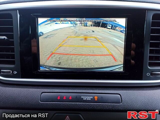 Сірий Кіа Sportage, об'ємом двигуна 1.6 л та пробігом 135 тис. км за 19500 $, фото 12 на Automoto.ua