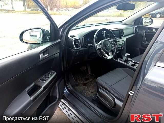 Сірий Кіа Sportage, об'ємом двигуна 1.6 л та пробігом 135 тис. км за 19500 $, фото 7 на Automoto.ua