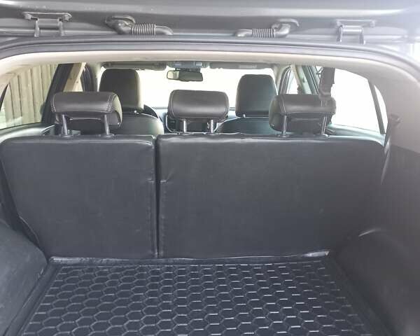 Серый Киа Sportage, объемом двигателя 1.6 л и пробегом 130 тыс. км за 18500 $, фото 8 на Automoto.ua