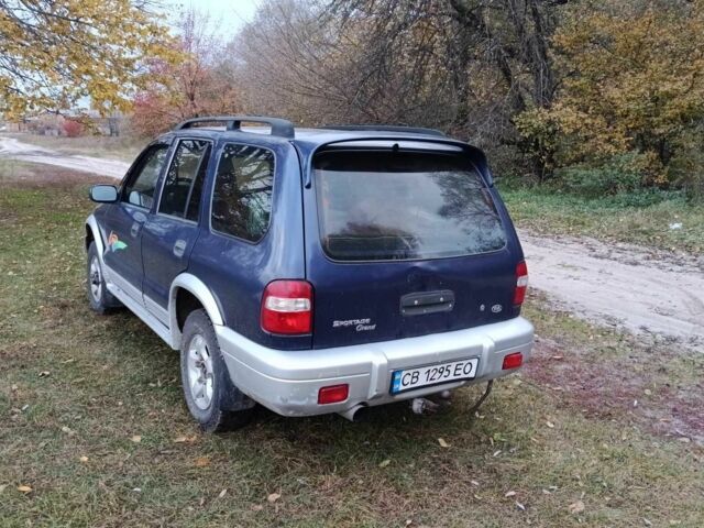 Синий Киа Sportage, объемом двигателя 2 л и пробегом 210 тыс. км за 3300 $, фото 2 на Automoto.ua